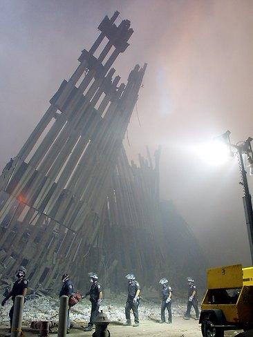 Firefighters making their way through the rubble of the World Trade Centre in New York after two hijacked planes flew into the landmark skyscrapers on September 11, 2001. AFP