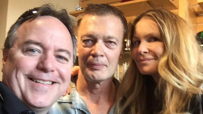 Elle Macpherson with Andrew Wakefield (C) and a fan at a 2019 autism conference in Chicago. Picture: Instagram