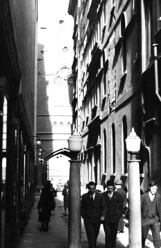 1930. Regent Place, Melbourne, in Regent Avenue, next to Queens Walk, running from Collins Street to Flinders Lane. The diocesan offices of St Pauls Cathedral are in the background.