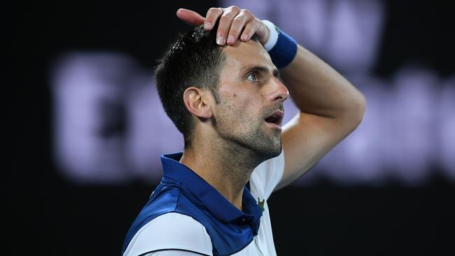 Novak Djokovic is out of the Australian Open. (AAP Image/Lukas Coch)
