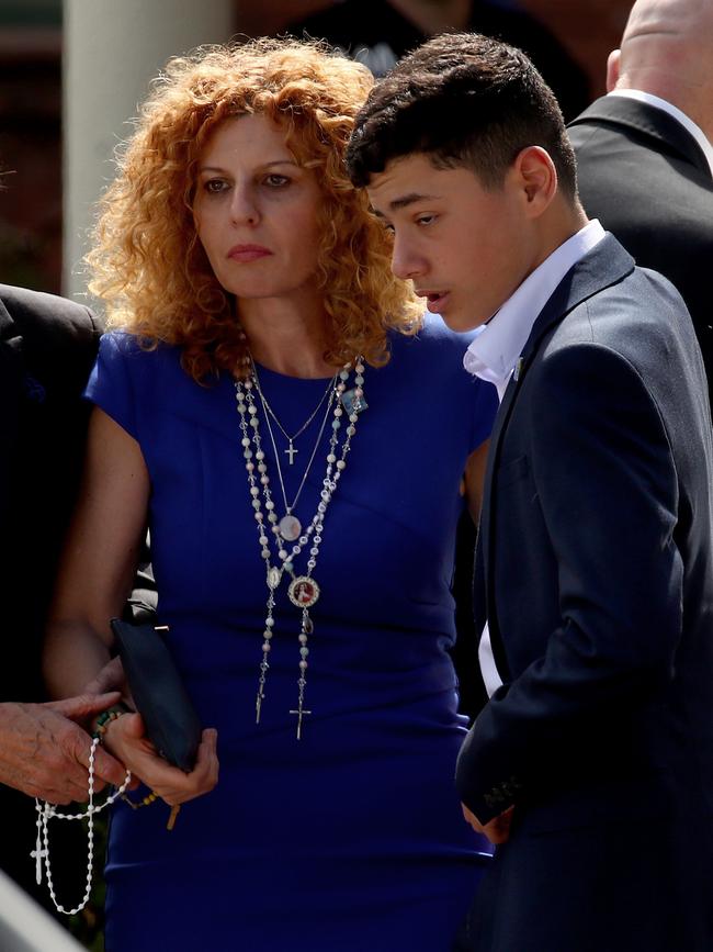 Mother Bridget Sakr supported by son Michael at Veronique’s funeral. Picture: Toby Zerna