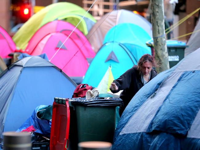 Still here ... A member of the homeless community in Martin Place. Picture: John Grainger
