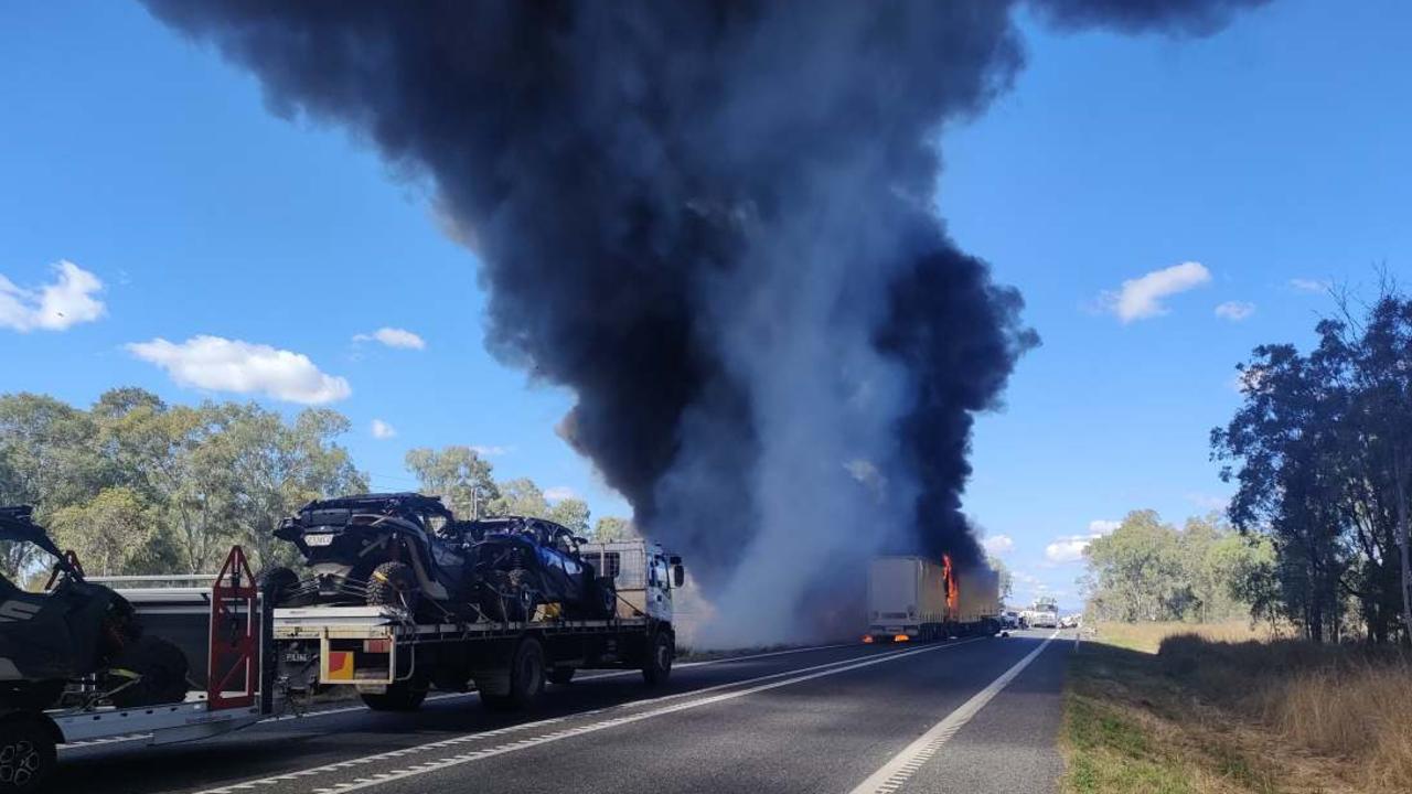 A truck on fire at the crash scene on the Bruce Highway, south of Rockhampton, on July 19, 2023.