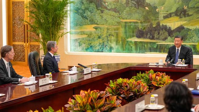 China's President Xi Jinping (R) speaks with US Secretary of State Antony Blinken (2nd L). 4. (Photo by Mark Schiefelbein / POOL / AFP)