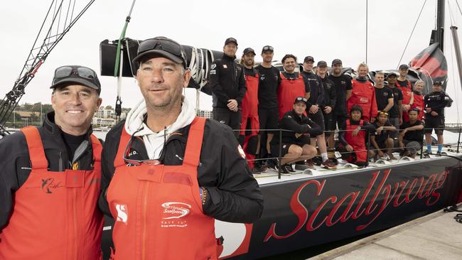 Skipper David Witt with Grant Wharington (left) and the Scallywag supermaxi crew at Birkenhead Marina. Pic: AAP/Matthew Vasilescu.