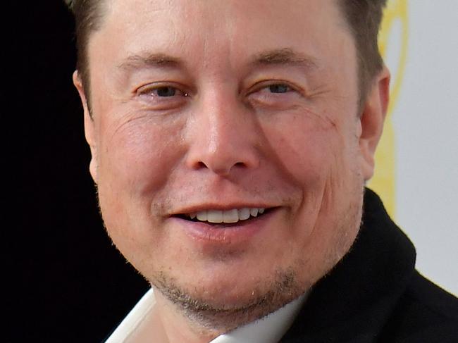 (FILES) In this file photo taken on November 12, 2019 Elon Musk, CEO of Tesla and SpaceX, poses on the red carpet as he arrives for the 43rd 