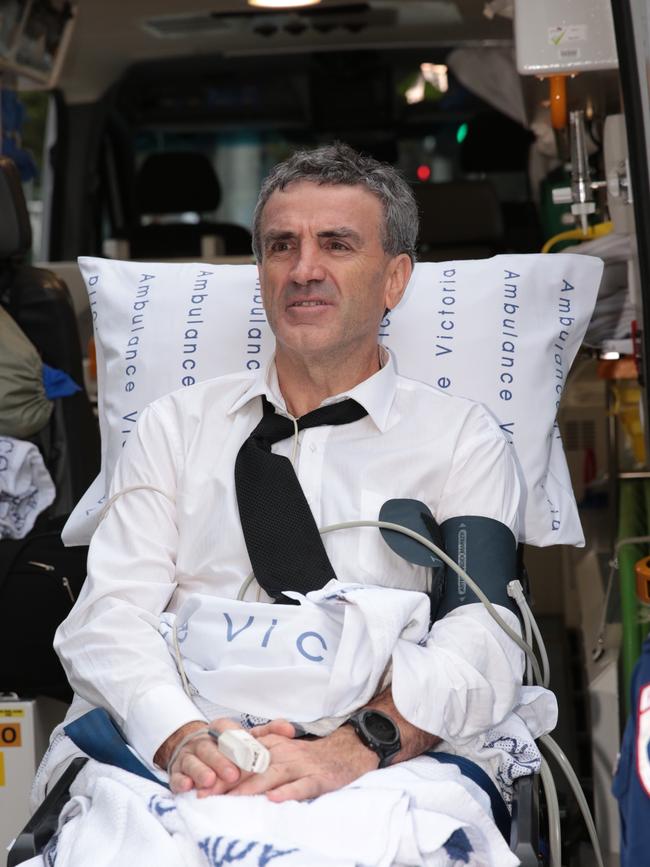 Dover responsible manager and owner Terry McMaster leaves the Federal Court with the aid of paramedics after collapsing while being questioned during the Banking Royal Commission in Melbourne, Thursday, April 26, 2018. Picture: AAP