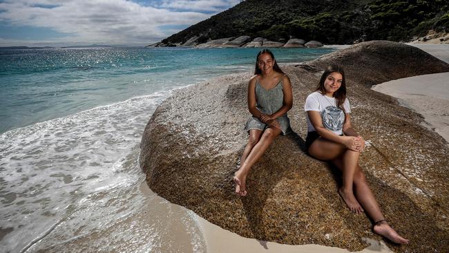 Noongar teenagers Jenaya Colbung and Tayla Winmar, at Albany’s Little Beach yesterday, have big plans for life after high school. Picture: Colin Murty