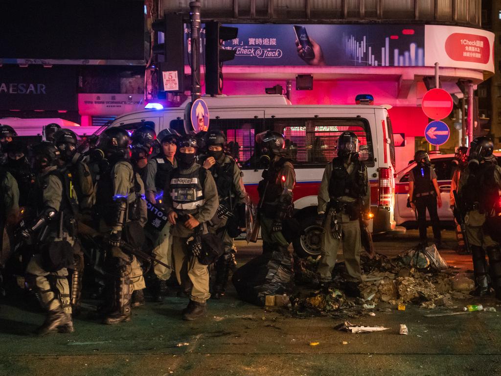 Riot police secure an area in Mongkok district in Hong Kong, China. Picture: Getty Images