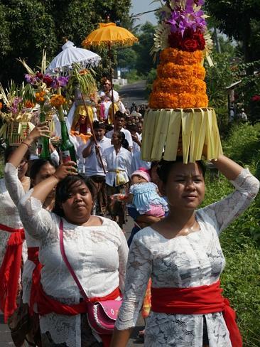 A funeral procession heads for the beach.