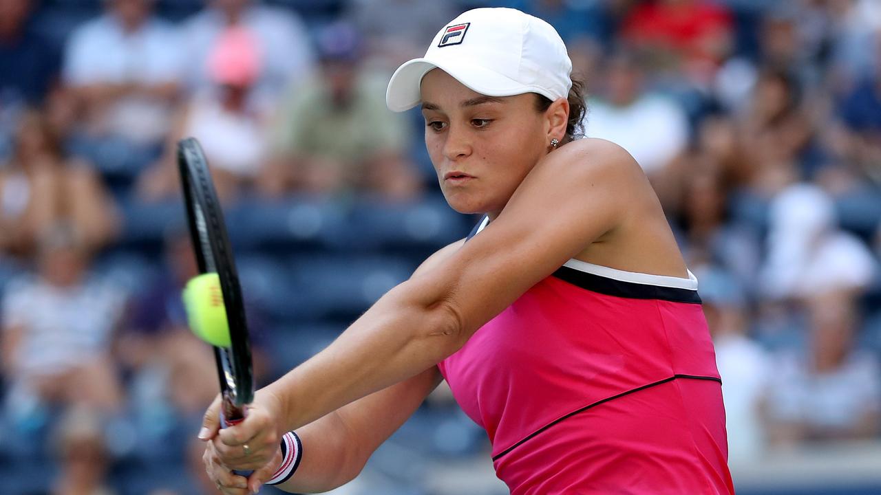 Ashleigh Barty of Australia returns a shot during her Women's Singles third round match.