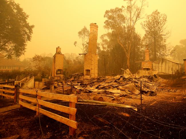 Remnants of a house in Cobargo after a firestorm swept through the area. Bushfires cut off the entire south coast of NSW on New Year’s Eve. Picture: Stuart McEvoy/The Australian.