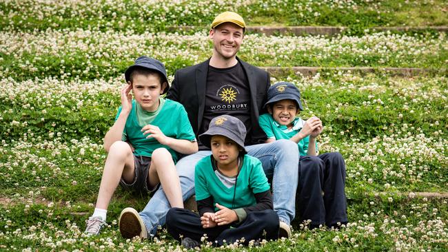 Woodbury School supervisor Ross Leighner with students take a break from their sports carnival. Picture: Julian Andrews.