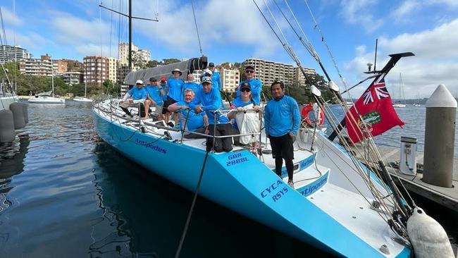 Sydney businessman Geoff Hill and crew aboard Antipodes.