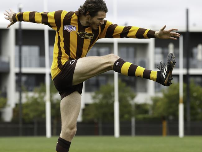 Hawthorn's Isaac Smith dresses up as club great Michael Tuck.