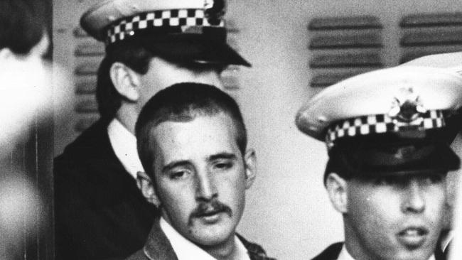 Under heavy police guard, Julian Knight, 19, who shot dead 7 people and wounded 19 in Hoddle Street, Clifton Hill. Hoddle St massacre. Pic Michael Potter