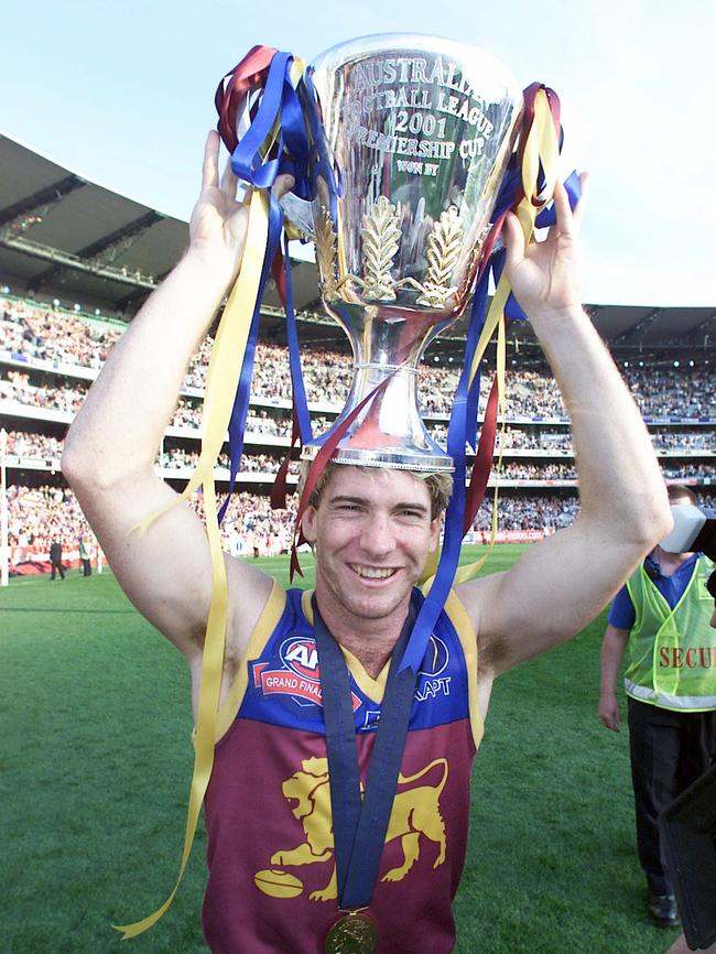 Jason Akermanis with the premiership cup.