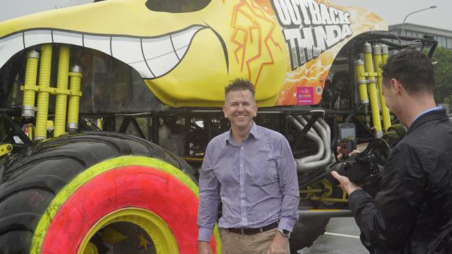 LNP Deputy Leader Jarrod Bleijie takes the wheel of a monster truck at Sunshine Coast Stadium, navigating the car park in the rain. Photo: Andrew Hedgman