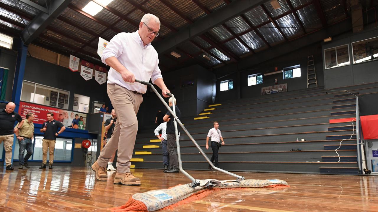 Prime Minister Scott Morrison defended his actions and said NSW and Qld had only just been declared a natural disaster. Picture: Darren England – Pool/Getty Images