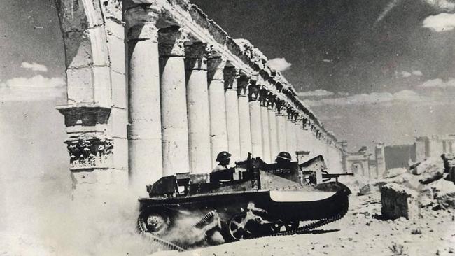 A British Bren Gun Carrier moves through the ancient ruins at Palmyra in 1941.