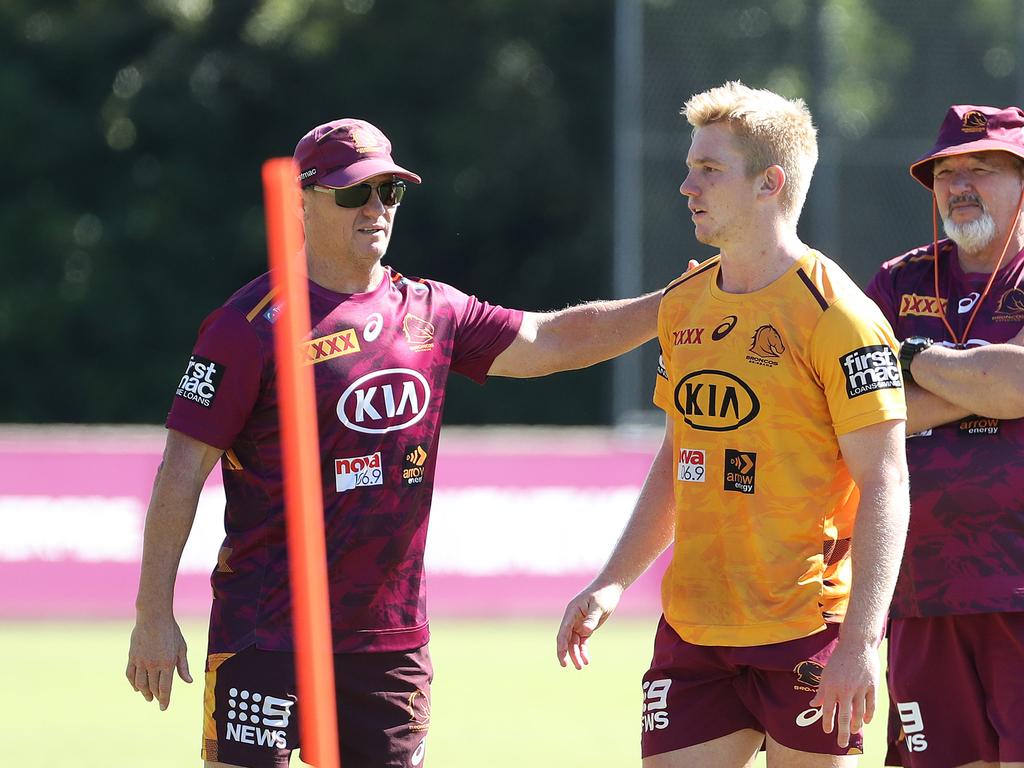 Coach Kevin Walters talking with Tom Dearden after the halfback signed with the Cowboys. Picture: Liam Kidston