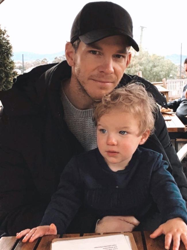 Tim Paine and his son.