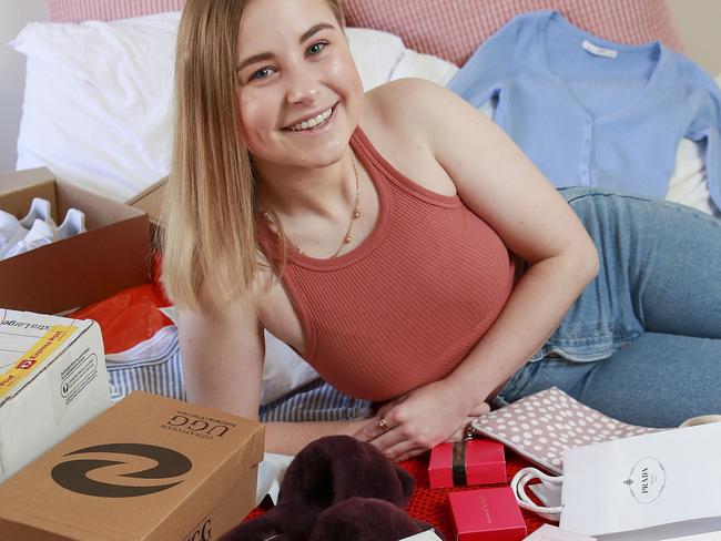 **PICS NOT TO RUN BEFORE SUNDAY OCT 4, 2020** Rebecca Strickland, from Dulwich Hill, at home with some of the purchases she has bought using buy now pay later scheme Afterpay. Picture:Justin Lloyd.