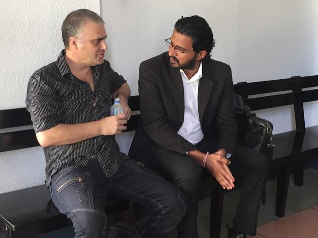 John Nikolic with his lawyer Wasu Pillay in discussion at Suva High Court. Picture: News Corp Australia