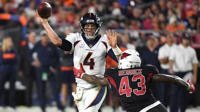 Denver quarterback Case Keenum throws under pressure against Arizona. Picture: AFP