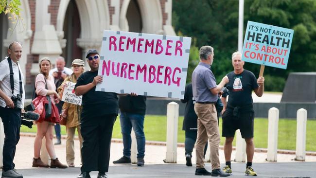 People are protesting outside of the Auckland High Court. Picture: Alex Burton/NZ Herald