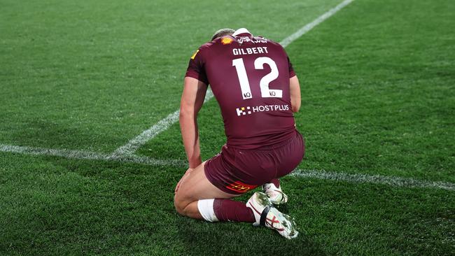 Tom Gilbert of the Maroons leaves the field injured during Origin game one. Picture: Getty