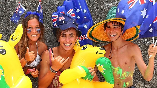 SYDNEY, AUSTRALIA - JANUARY 26: Beachgoers pose on Bondi beach as part of the 2013 Australia Day Celebrations on January 26, 2013 in Sydney, Australia. Australia Day, formerly known as Foundation Day, is the official national day of Australia and is celebrated annually on January 26 to commemorate the arrival of the First Fleet to Sydney in 1788. (Photo by Brendon Thorne/Getty Images)