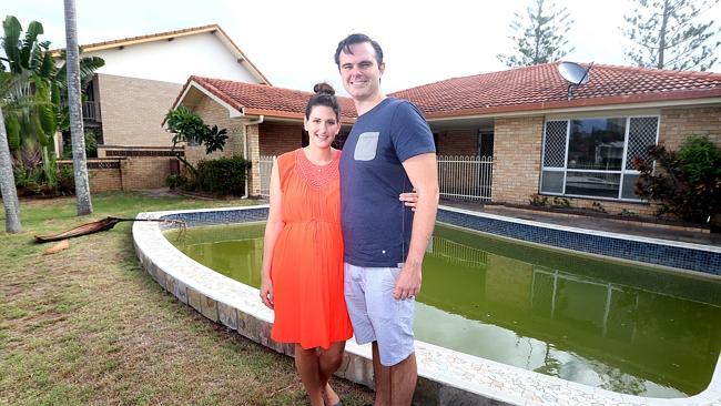 Anthony Puljich and Katarina Puljich following their successful bid of $1,405,000 for a property at Admiralty Drive, Surfers ...