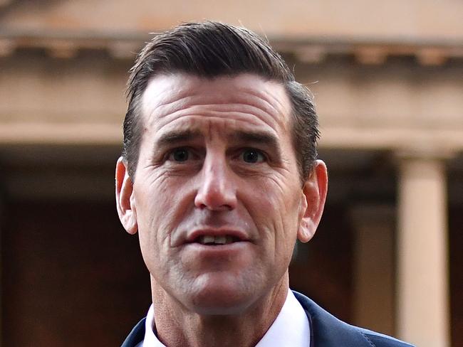 SYDNEY, AUSTRALIA - JUNE 07: Ben Roberts-Smith arrives at the Federal Court of Australia in Sydney on June 07, 2021 in Sydney, Australia. Ben Roberts-Smith is suing three Fairfax newspapers for defamation over reports he committed war crimes while serving in the Australian Special Air Services in Afghanistan. Ben Roberts-Smith is Australia's most decorated living soldier and a Victoria Cross recipient. (Photo by Sam Mooy/Getty Images)