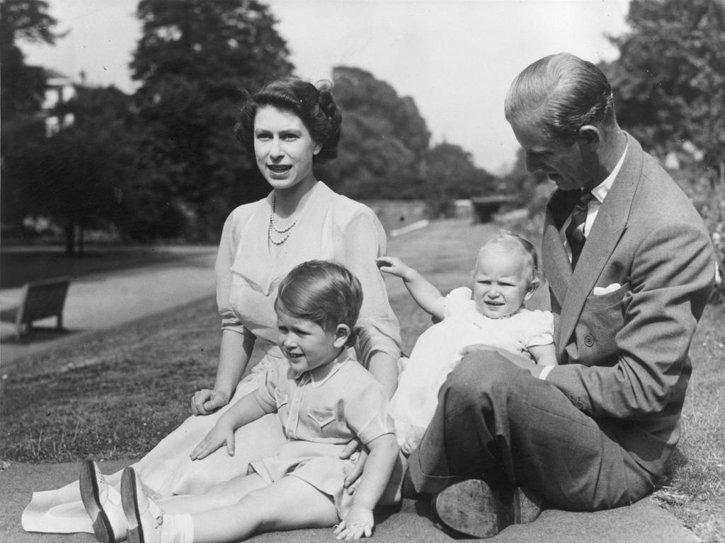 9th August 1951: Princess Elizabeth and Prince Philip, Duke of Edinburgh with their two children, Prince Charles and Princess Anne in the grounds of Clarence House, London. (Photo by Fox Photos/Getty Images)