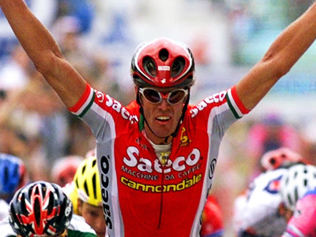 Cycling - Italian cyclist Mario Cipollini crossing line to win seventh stage of Tour de France race. He became the first cyclist to win four successive Tour de France stages.