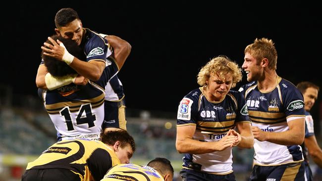 The Brumbies celebrate a try by Robbie Abel during the round three Super Rugby match.