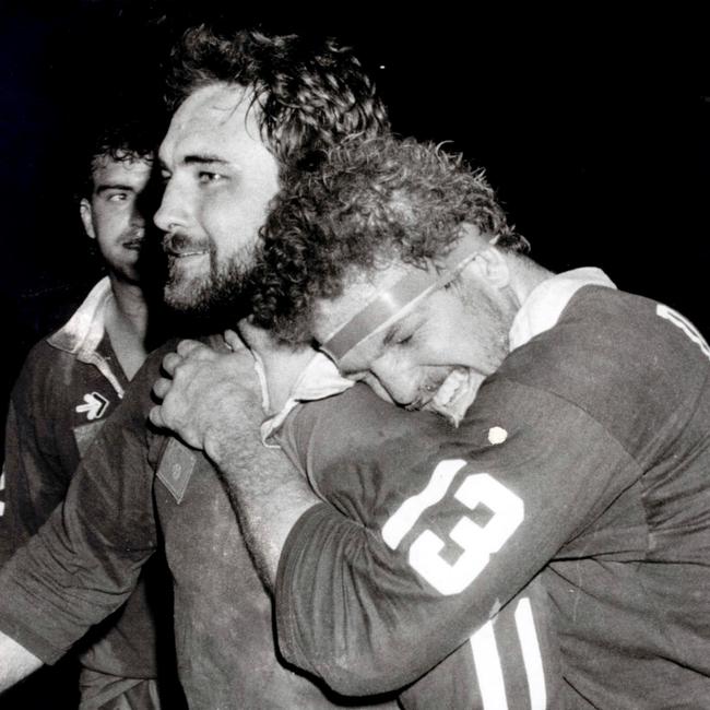 Bryan Niebling gets a hug from Greg Dowling after a 1987 State of Origin match at Lang Park