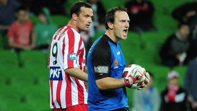 New Adelaide United performance coach Gerald Sibon, pictured playing against Reds goalkeeper coach Eugene Galekovic.