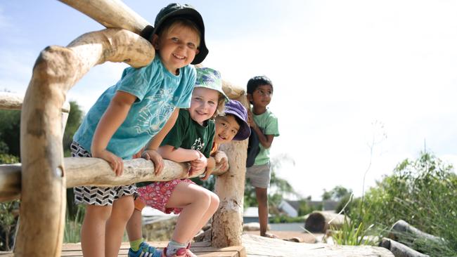 Blair, Rachael, Charles and Shiven, all 4, enjoying the new nature playground at Netley. Picture: AAP/Morgan Sette