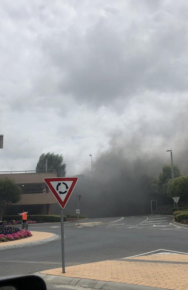 Smoke blankets the car park entrance at Chadstone. Picture: Twitter/@!ashhendel