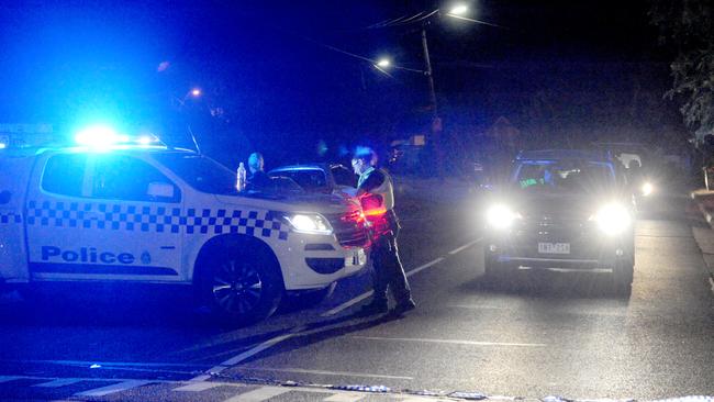 Police at the scene of the double fatal shooting. Picture: Andrew Henshaw