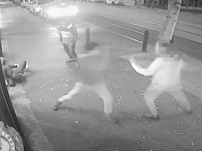 Police have released footage of two men assaulting a pair of teenagers on Jetty Road in Glenelg. Incident was in June 2020. Picture: SA Police