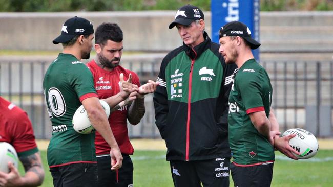 Cody Walker speaks with Rabbitohs captain Adam Reynolds, coach Wayne Bennett and hooker Damien Cook at Rabbitohs training at Redfern Oval on Monday. Picture: Adam Yip