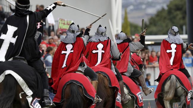 The Crusaders horsemen ride around the arena prior to the start of the Super Rugby match between the Crusaders and Hurricanes. Picture: AP