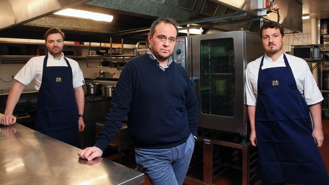 Melbourne restaurateur Matteo Pignatelli, centre, with pastry chef Ross Eckersley, left, and head chef Rhys Blackley at his Fitzroy North establishment. Picture: Aaron Francis