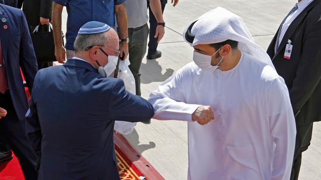 Israeli National Security Adviser Meir Ben-Shabbat elbow bumps an Emirati official before leaving Abu Dhabi. Picture: AFP