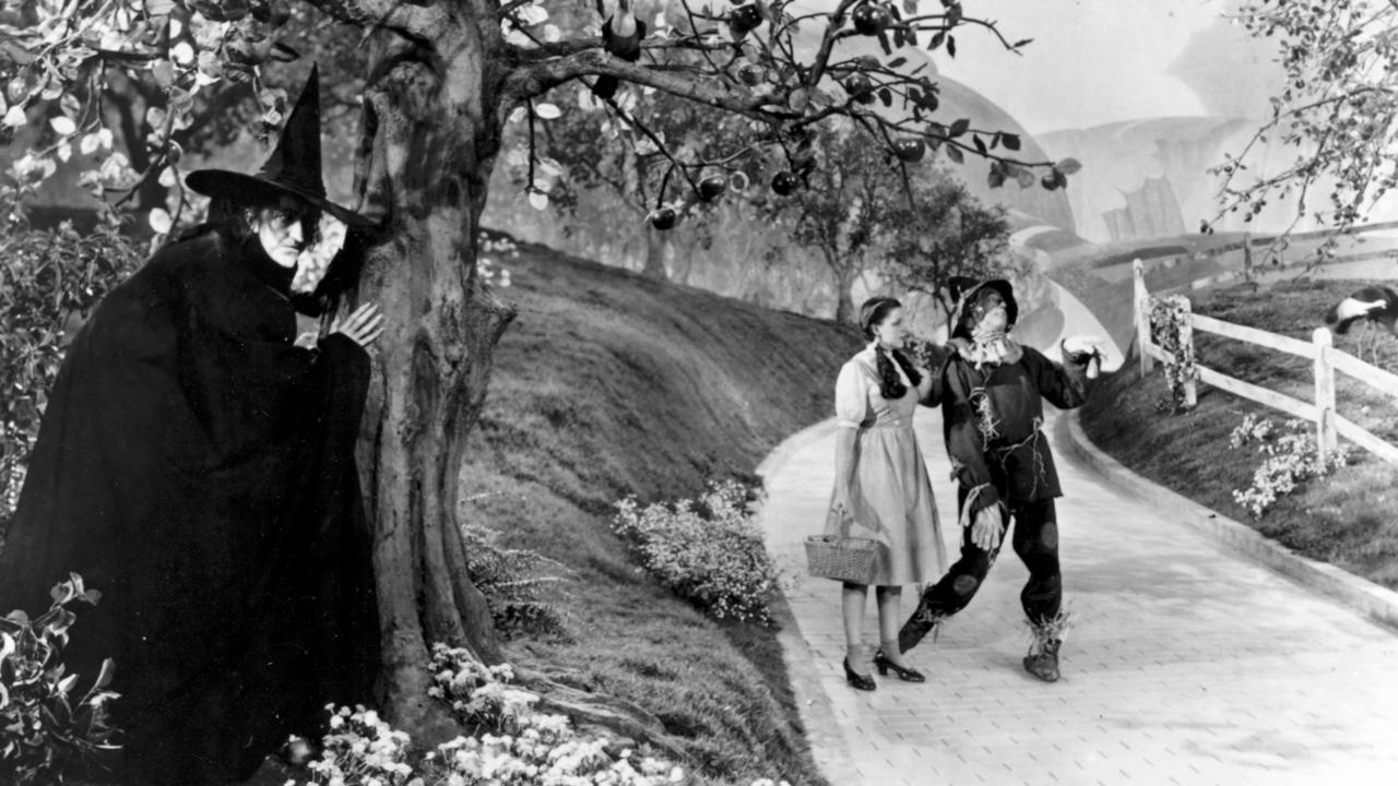 File pic Scene from film 'The Wizard of Oz ' - movies 1939 actress Judy Garland as Dorothy the scarecrow actor Ray Bolger and witch