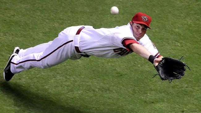 Oeltjen makes a diving catch on a ball for the Arizona Diamondbacks v New York Mets.