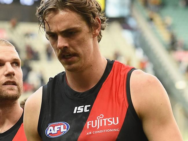 MELBOURNE, AUSTRALIA - MAY 05:  Jake Stringer and Joe Daniher of the Bombers look dejected after losing the round seven AFL match between the Essendon Bombers and the Hawthorn Hawks at Melbourne Cricket Ground on May 5, 2018 in Melbourne, Australia.  (Photo by Quinn Rooney/Getty Images)